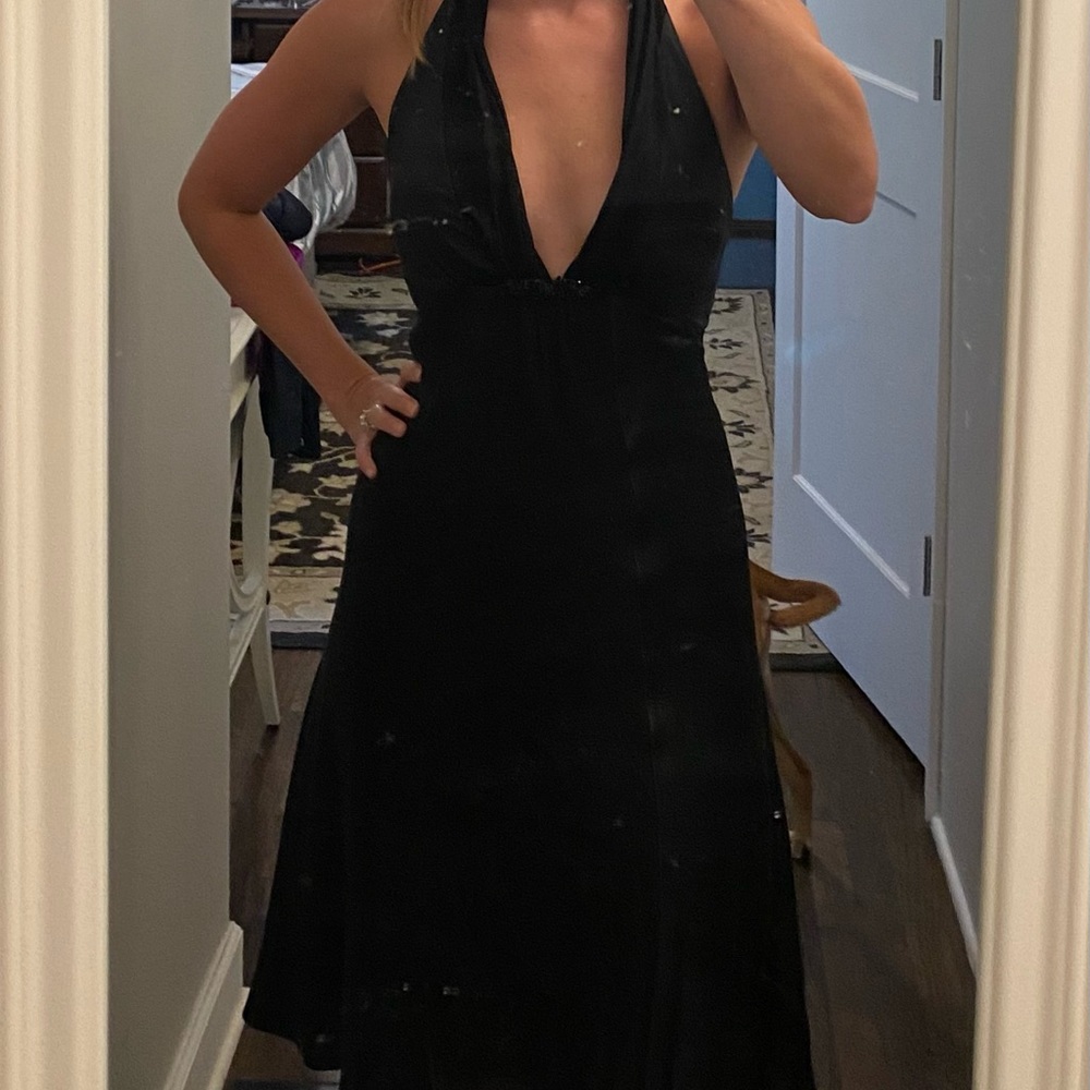 Little black dress with plunging neckline. White House Black Market Size 0.